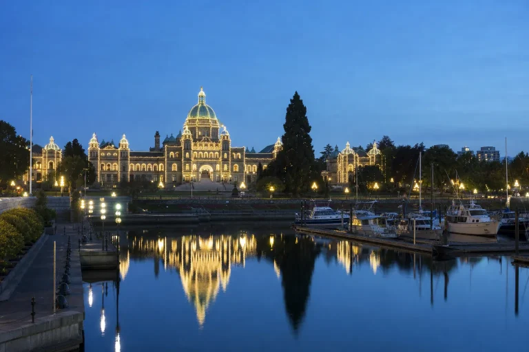 British Columbia Parliament Buildings in Victoria at dusk, illustrative image